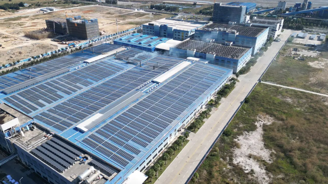 Aerial view of an industrial estate with solar arrays covering several warehouse roofs
